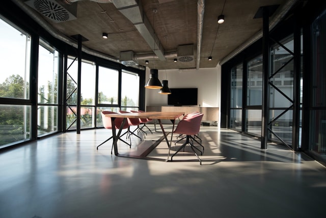 Industrial themed conference room where team goal discussions take place